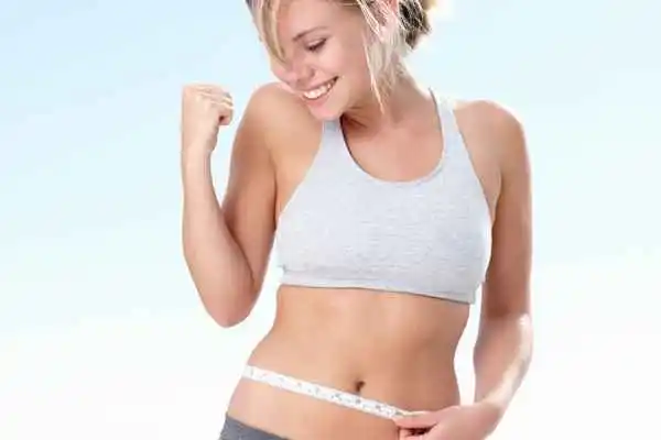 woman happy after fat reduction treatment Essex